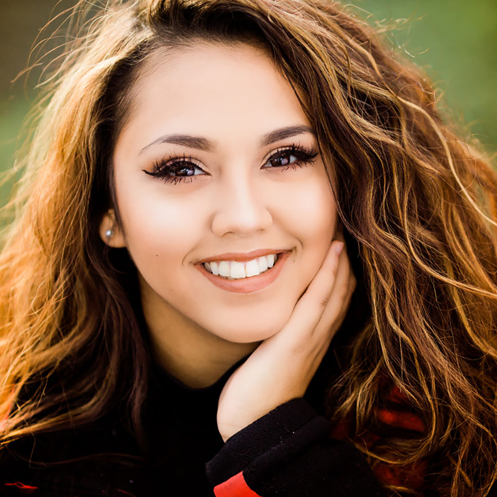 Photo of a female high school senior portrait taken by Andrae Michaels National Portrait Studio in Colorado Springs